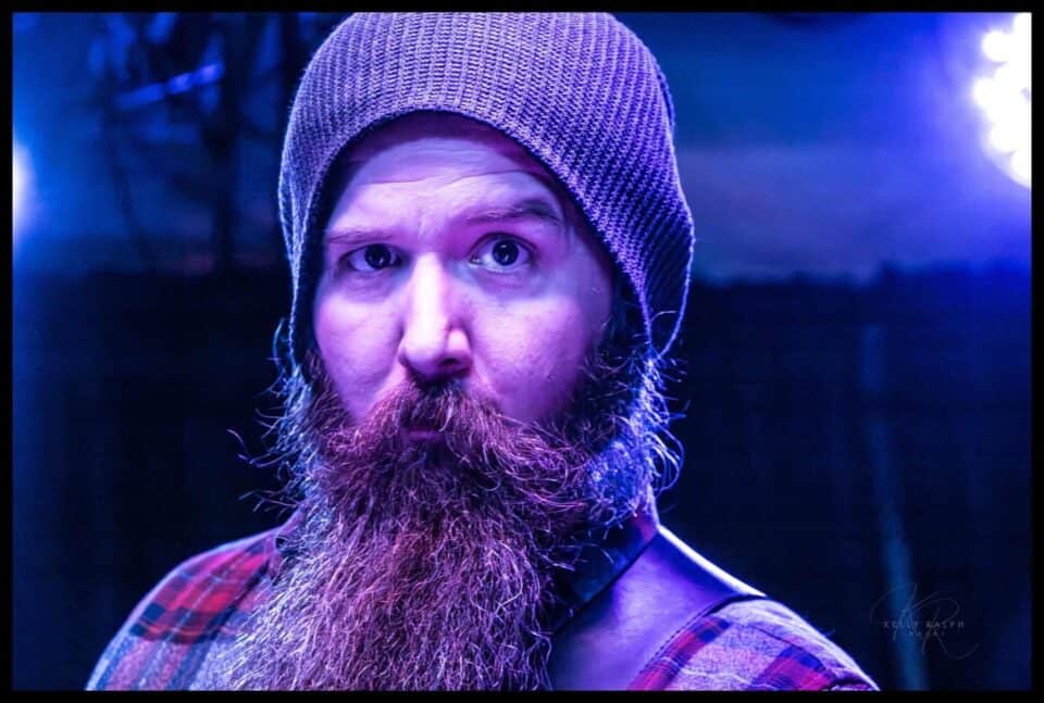 Taylor giving the camera a jovial 'don't take me too seriously' look.